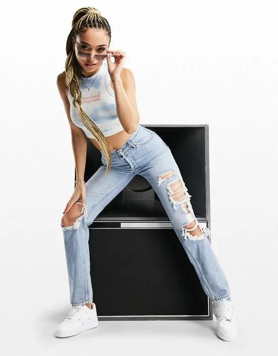 mid rise '90s' straight leg jeans in lightwash with extreme rips