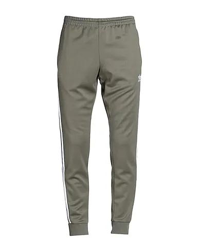 Military green Casual pants ADICOLOR CLASSICS SST TRACKPANT IN PRIME BLUE
