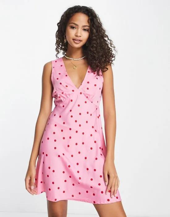 mini dress in pink polka dot