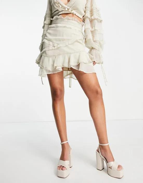 mini skirt with ruffle detail in stone - part of a set