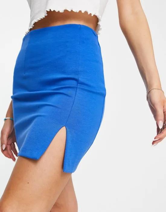 mini skirt with split hem in pop blue