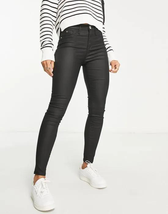 Molly mid rise coated skinny jeans in black