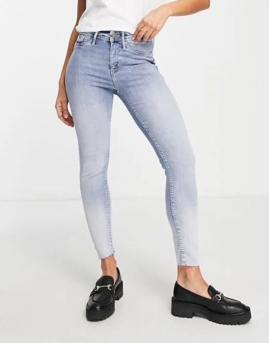 Molly mid rise two-tone skinny jeans in light blue