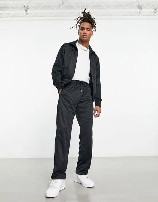 Monogram full zip sweatpants in black