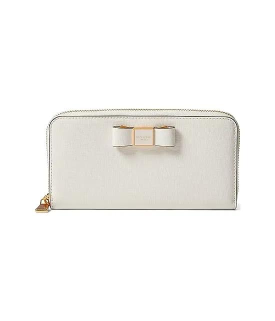 Morgan Bow Embellished Saffiano Leather Zip Around Continental Wallet