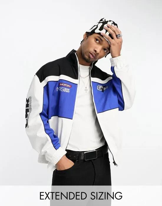 motocross bomber jacket with badging in blue and white