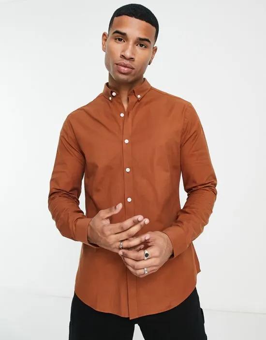 muscle fit oxford shirt in tan