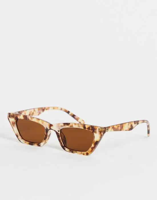 narrow cat eye sunglasses in tortoiseshell
