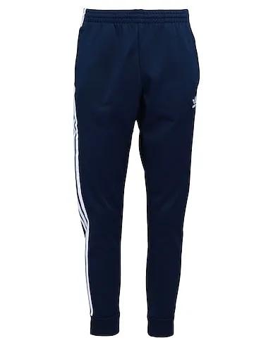Navy blue Casual pants ADICOLOR CLASSICS SST TRACKPANT IN PRIME BLUE
