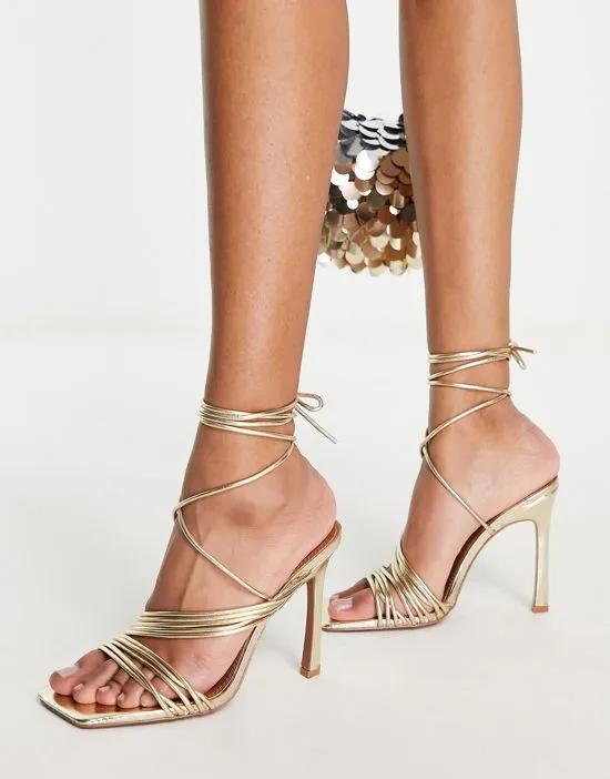 Nest strappy tie leg heeled sandals in gold