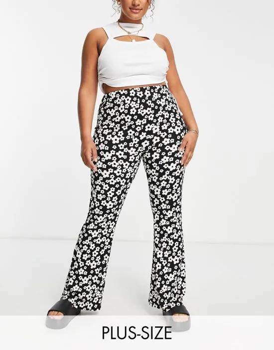 New Look Curve flared pants in black retro floral
