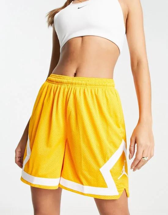 Nike Air  Heritage Diamond shorts in taxi yellow and white