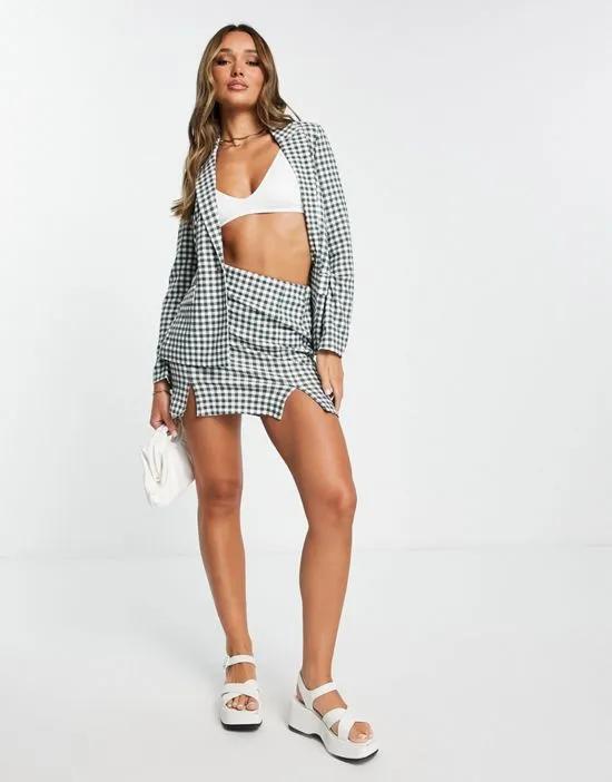 notch front mini skirt in green gingham - part of a set