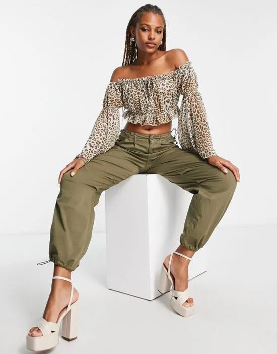 off shoulder sheer top with flared sleeve in leopard print