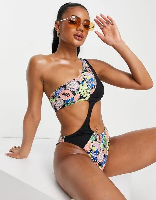 one shoulder cut out swimsuit in block fruit print