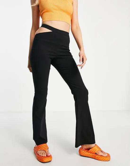one side cut out bengaline flared pants in black