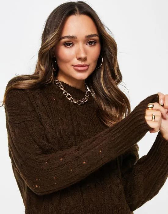 open stitch sweater in cable in brown