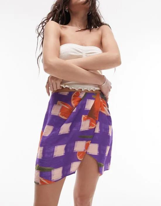orange plaid printed mini skirt in purple