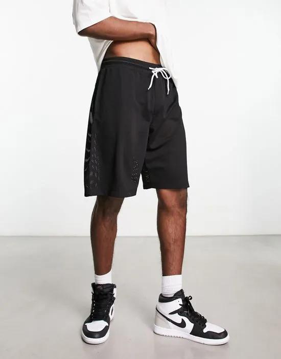 oversized basketball shorts in black sporty mesh