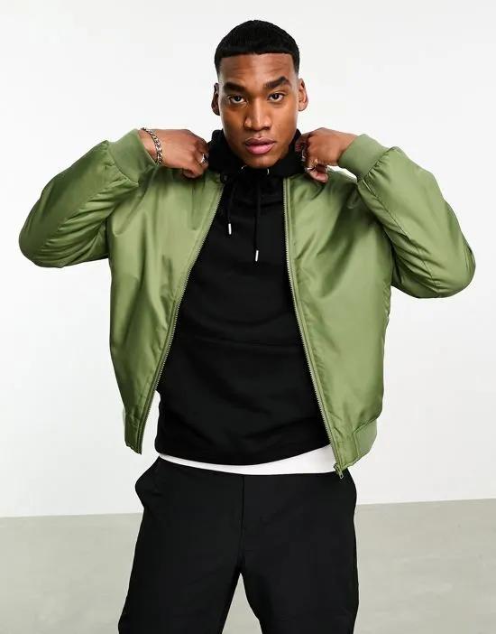oversized bomber jacket with detachable sleeves in green