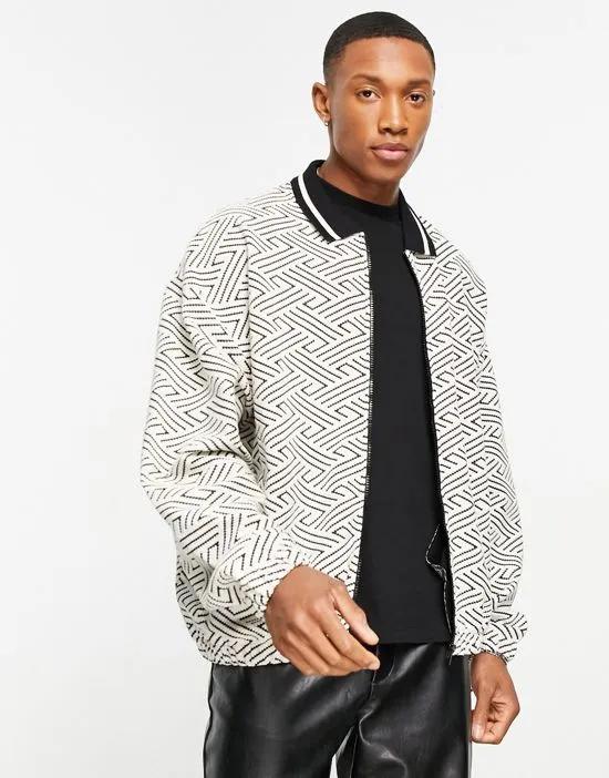 oversized harrington jacket in black and white geo jacquard