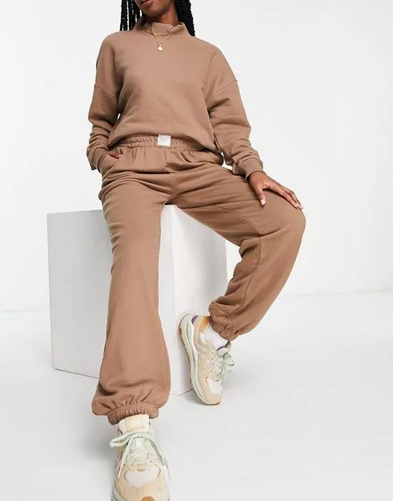 oversized high neck sweatshirt and sweatpants set with woven logo tab in taupe