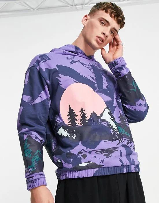 oversized hoodie in purple with all over mountain print