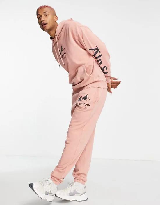 oversized hoodie in washed pink with mountain and text prints - part of a set