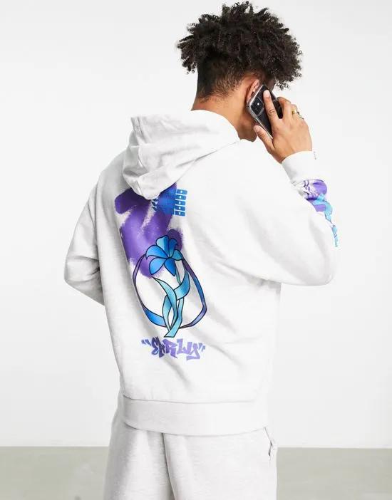 oversized hoodie in white heather with graffiti back and sleeve print
