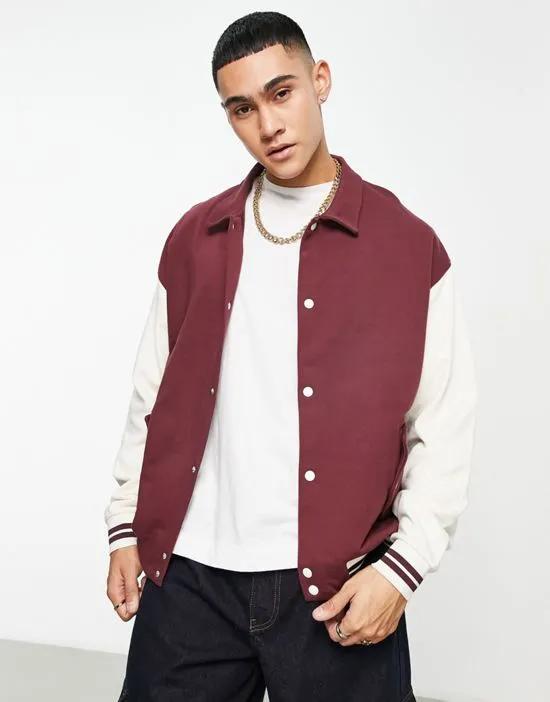 oversized jacket in burgundy with contrast sleeves and tipping