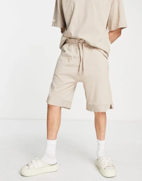 oversized jersey shorts in beige - part of a set