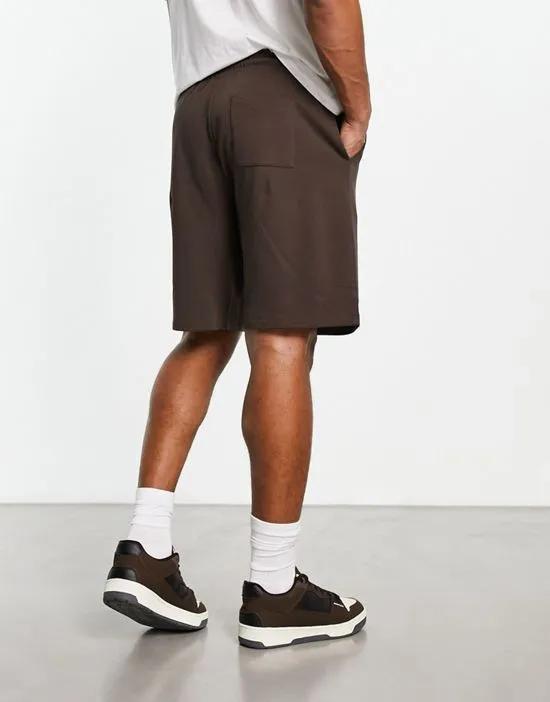 oversized jersey shorts in brown