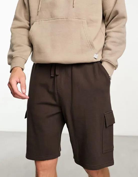 oversized jersey shorts with cargo pocket in brown