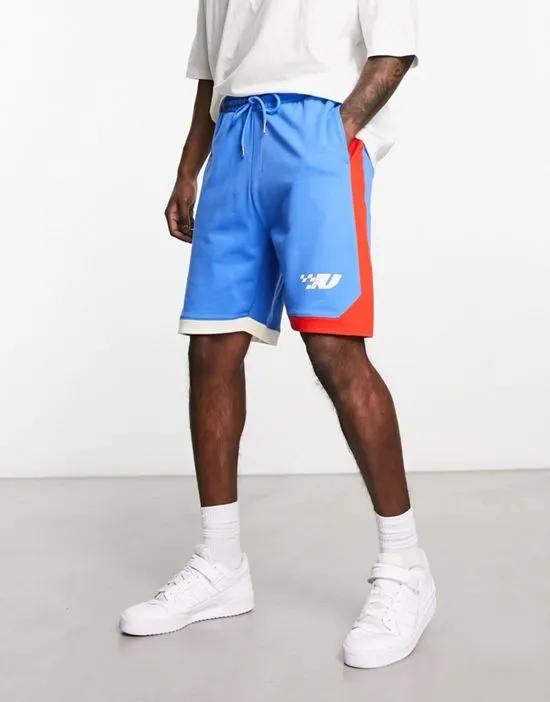 oversized jersey shorts with color block in blue