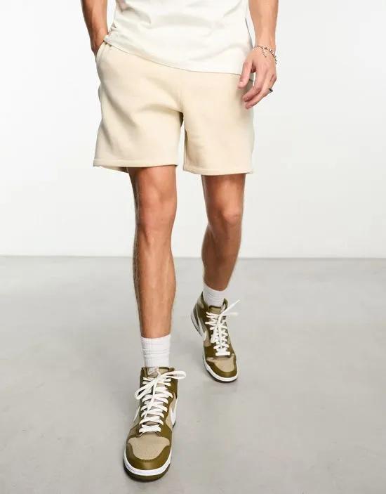 oversized jersey shorts with snaps in beige