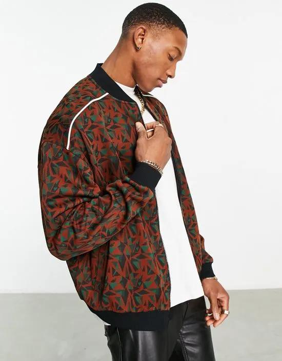 oversized jersey track jacket in patterned jacquard with piping