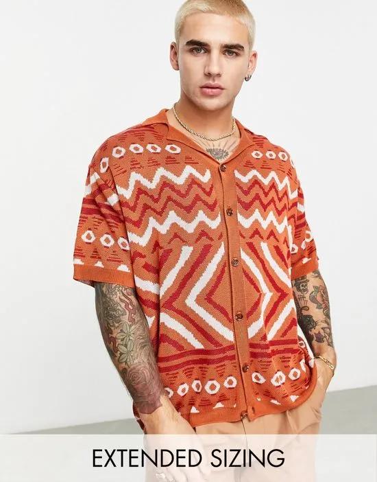 oversized knitted revere collar polo shirt with aztec print in orange