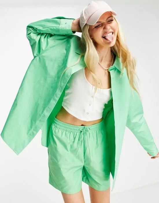 oversized nylon shirt in green - part of a set