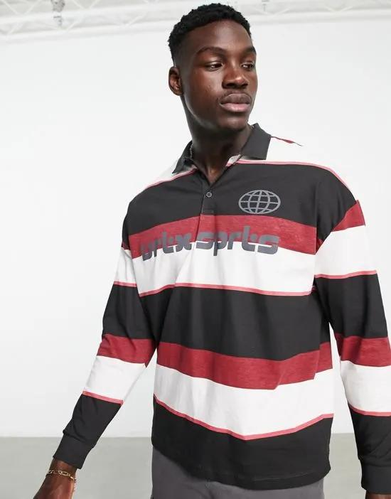 oversized polo t-shirt in black & pink stripe with front print