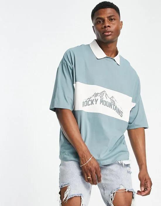 oversized polo T-shirt in green with mountain print