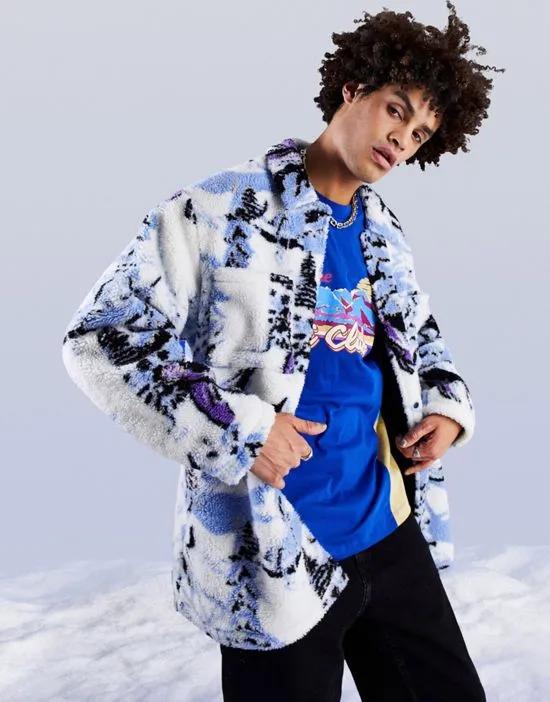 oversized shacket in white sherpa with apres ski print detail