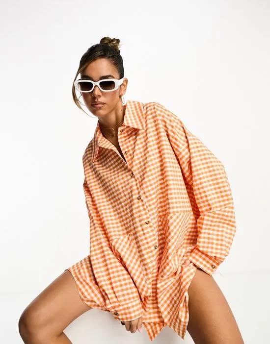 oversized shirt dress with big dropped pockets in orange plaid
