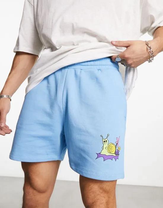 oversized shorts in blue with cartoon print