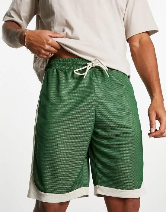 oversized shorts in green color block sporty mesh