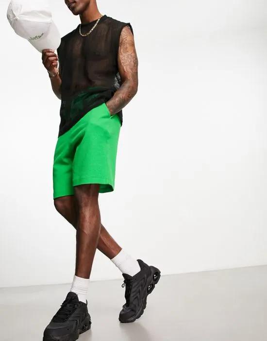 oversized shorts in green waffle