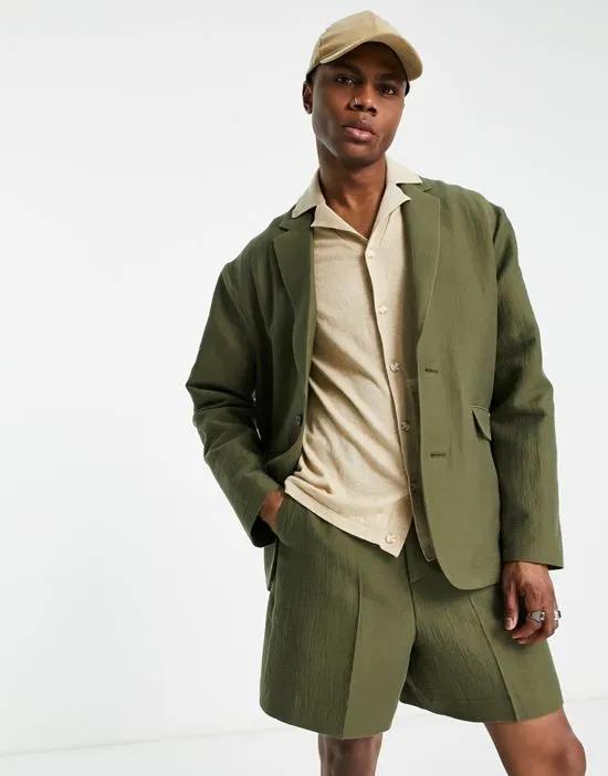 oversized soft tailored suit jacket in khaki green crinkle texture