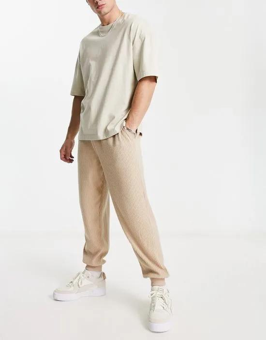oversized sweatpants in beige brushed rib texture