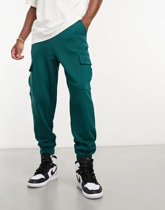 oversized sweatpants with cargo pocket in teal green