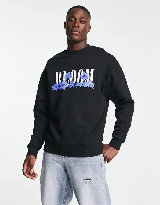 oversized sweatshirt in black with floral text print