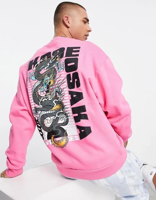 oversized sweatshirt in pink with dragon back print